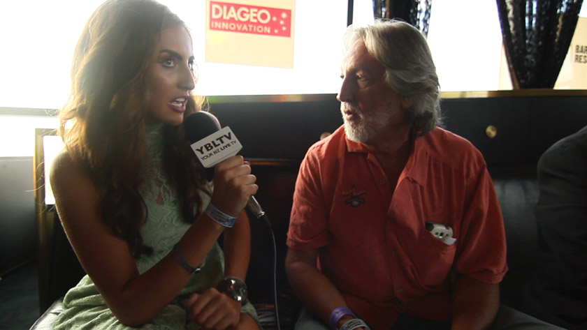 Andy Herbst Owner/Creator, Rock n Roll Tequila talks with YBLTV Anchor, Chris Salas at On the Rocks Las Vegas (Your Biz LIVE Photo/On the Rocks Las Vegas)