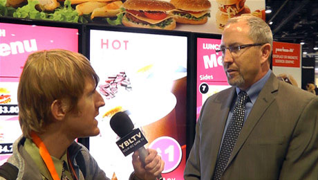Brian McClimans, Vice President of Global Business Development for Peerless A/V chats with YBLTV Anchor, Eric Sheffield at the 2015 Digital Signage Expo.