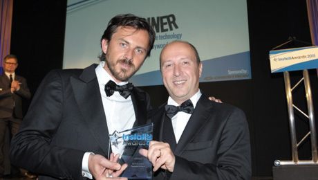 Powersoft sales director Luca Giorgi (right) and head of brand and communications Francesco Fanicchi (left) accept the Star Product Awarded in the Hospitality category at the InstallAwards 2015.